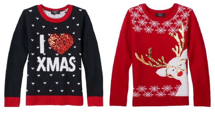 dark navy jumper, with a white hearts pattern, a festive message, and a red heart, covered in sequins, red jumper with white snowflakes, and a white cartoon deer, with rose gold antlers and glasses