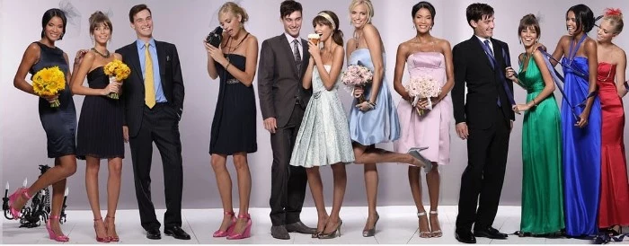 nine women dressed in different fancy dresses long silky gowns, little black dresses, midi dresses in silver, and pastel colors, cocktail attire for women, three men in dark colored suits 