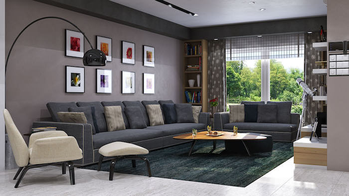 dark grey walls, large dark grey sofas with beige and black throw pillows, tiled floor with dark green carpet, interior design ideas