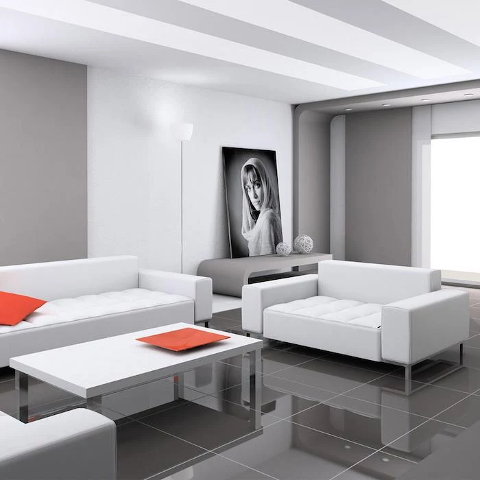 white and grey walls, white sofas with orange throw pillows, dark grey tiled floor, home decor ideas for living room