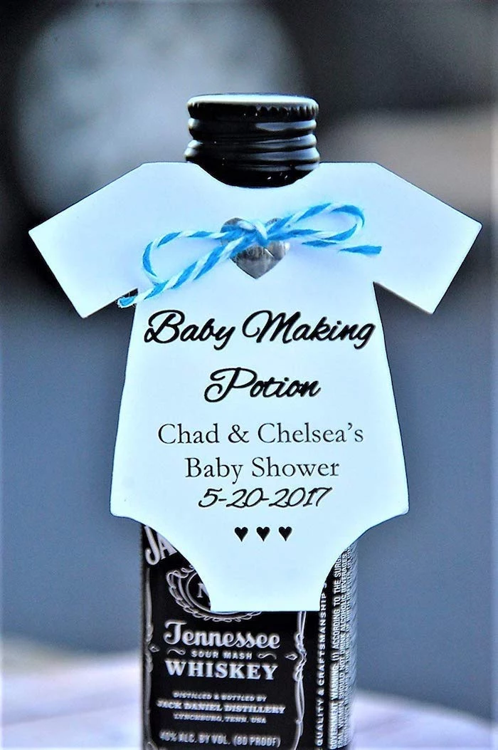baby making potion label, blue and white bow, unique baby shower themes, jack daniels whiskey bottle