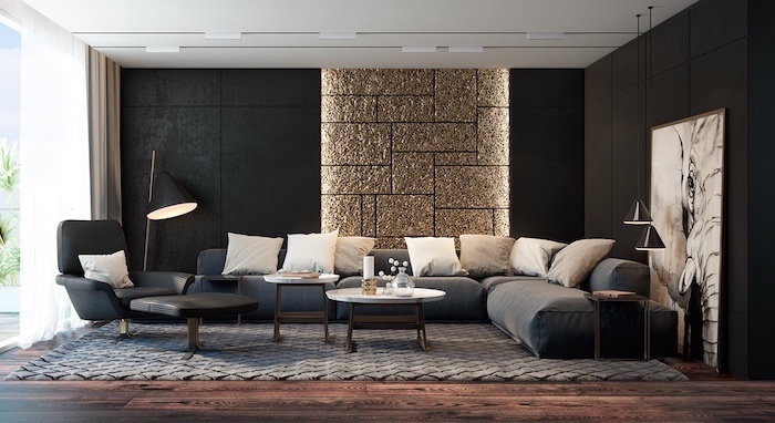 black and gold sequinned tiled wall, accent wall living room, grey corner sofa, wooden floor