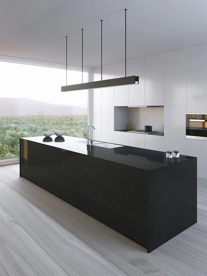 black kitchen island, wooden floor, beautiful kitchens, white cabinets and drawers, hanging lights