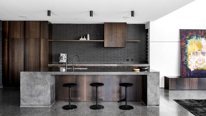 black bricks backsplash, kitchen ideas, black stools, wooden kitchen island and cabinets