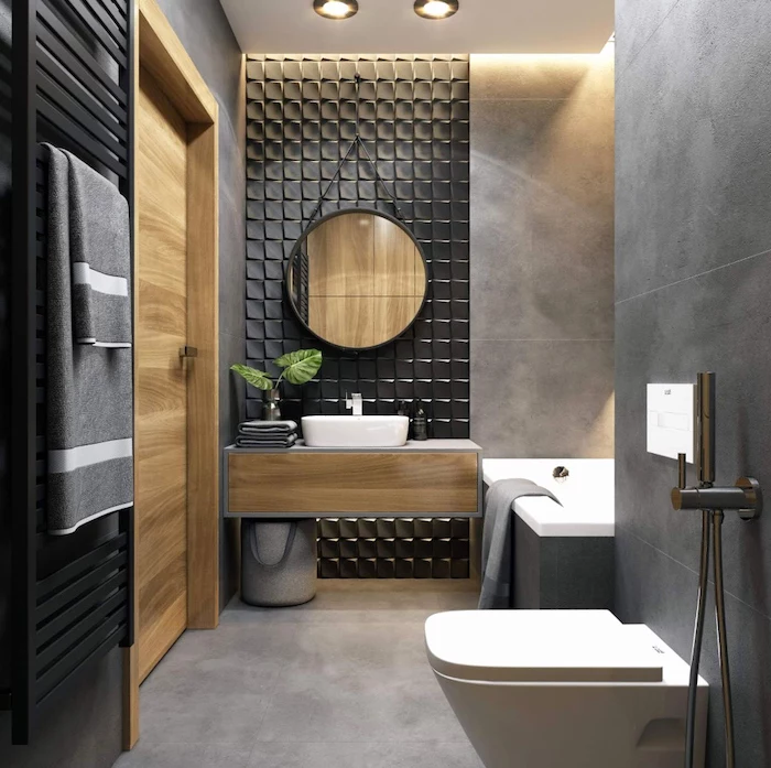 black tiled accent wall, bathroom designs for small spaces, wooden floating cabinet, grey tiled walls