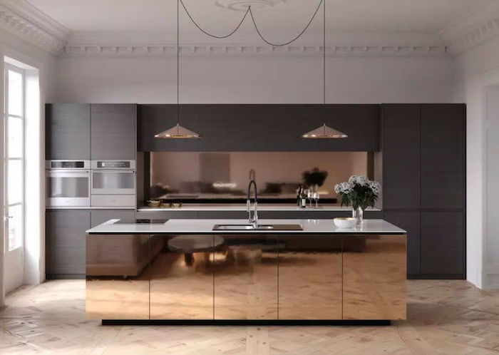 wooden cabinets and drawers, kitchen wall decor ideas, brass kitchen island, white counters