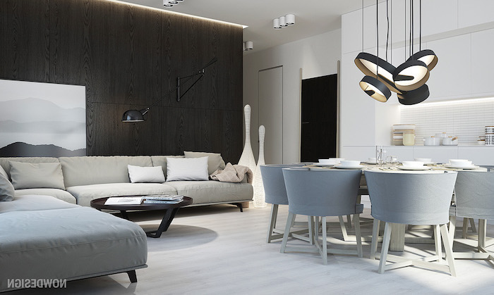 white corner sofa, dark wooden tiles on the wall, wall treatments, wooden floor