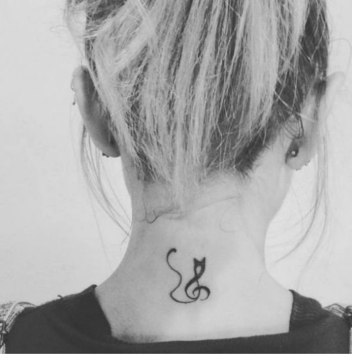 cat tattoo on the neck, blonde hair in a bun, white background, tattoos for women with meaning