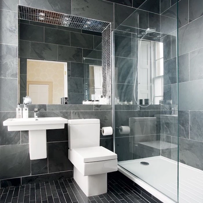 grey marble tiled walls, black tiled floor, glass shower door, small bathroom design ideas