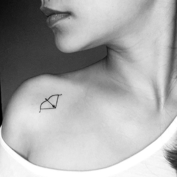 bow and arrow, tattoo on shoulder, white blouse, small tattoos for girls