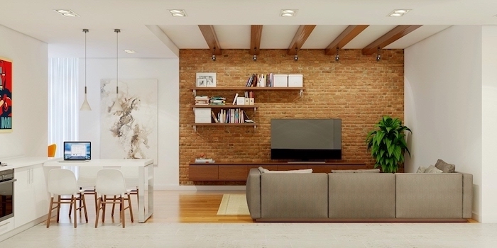 brick wall, grey sofa, living room wall colors, wooden bookshelves and cabinet, wooden floor