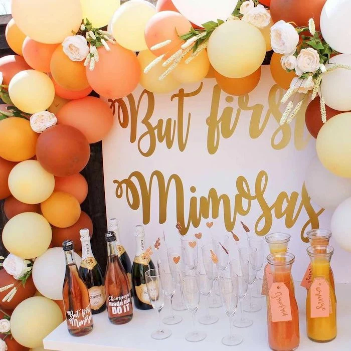 but first mimosas sign, shades of orange balloons, champagne bottles, unique bachelorette party ideas