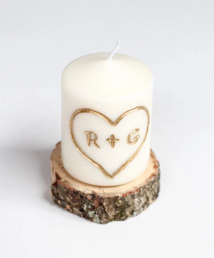 white candle with golden initials, wooden coaster, personalised gifts for boyfriend