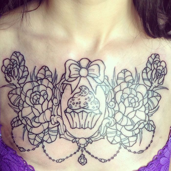 purple bra, brown hair, flowers bow and cupcake large tattoo, chest tattoo ideas