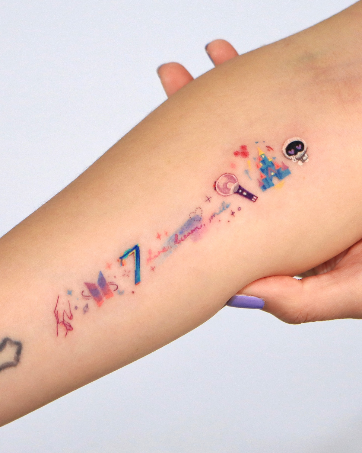 colorful bts and disney tattoo