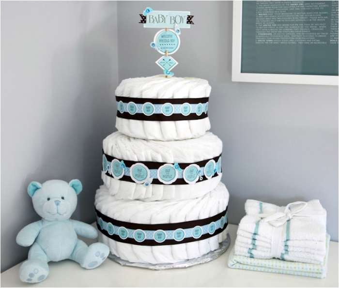 diaper cake, black and blue ribbons, baby boy cake topper, baby shower themes, blue plush teddy bear