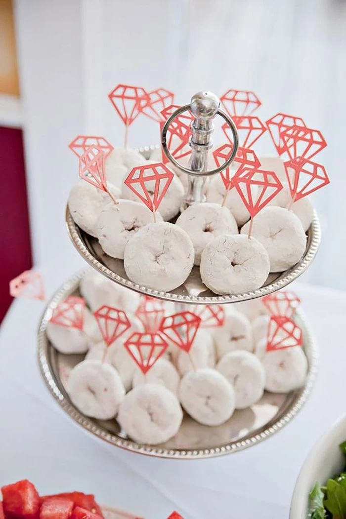 white donuts with diamonds, bachelorette shirt ideas, silver cake stand, white background