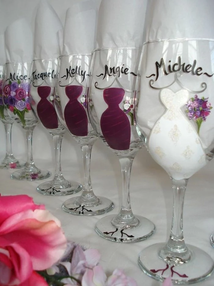 champagne flutes, name inscriptions, unique bachelorette party ideas, painted dresses and flowers