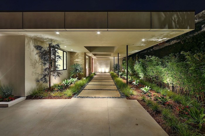 marble tiles entryway, tall trees, simple front yard landscaping ideas with pictures, patches of grass and bushes