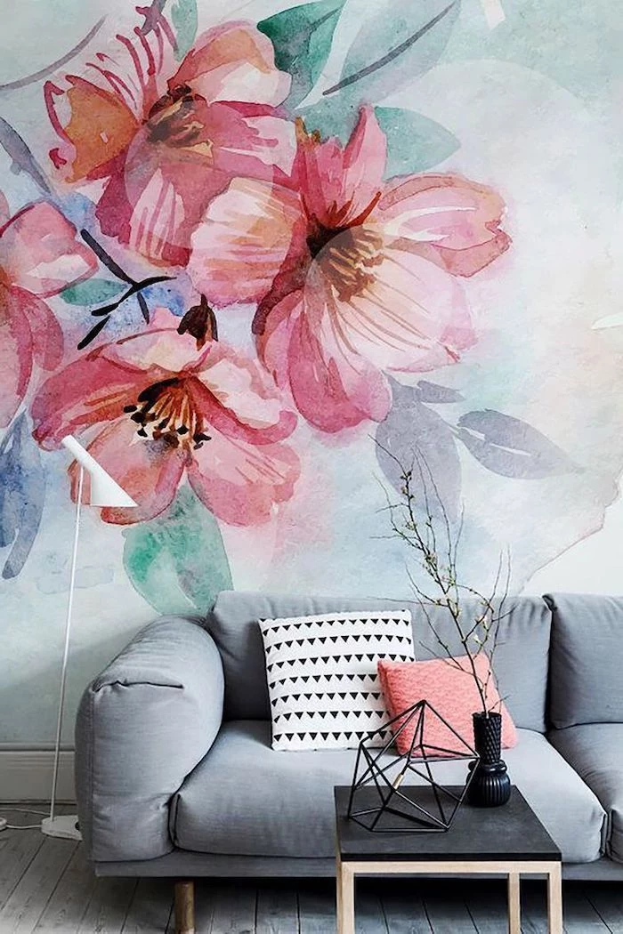 flowers painting wallpaper, accent wall, grey sofa, small black coffee table