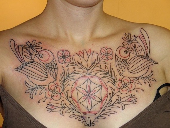 brown top, orange background, chest tattoo ideas, geometrical flowers and birds tattoo