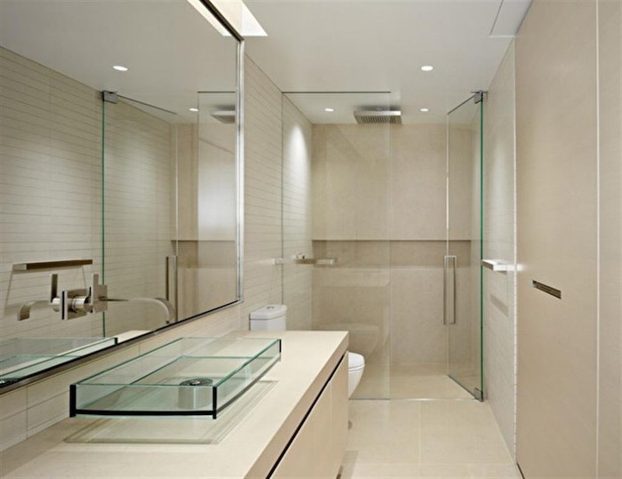 beige tiled walls and floor, glass sing, glass shower door, bathroom renovation ideas, large mirror