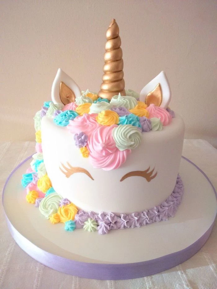 purple pink blue and yellow roses on white fondant, gold horn and ears, diy unicorn cake