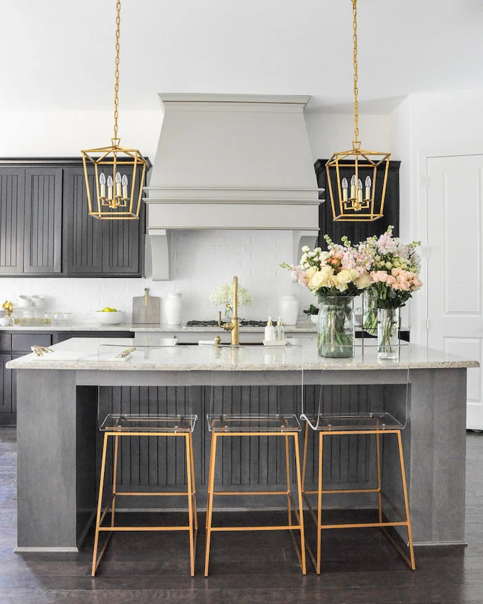 golden lantern chandeliers, gold and plastic bar stools, grey cabinets, kitchen cabinet design