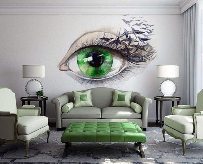 green eye painting on the white wall, grey sofa, living room paint ideas, green stool and armchairs