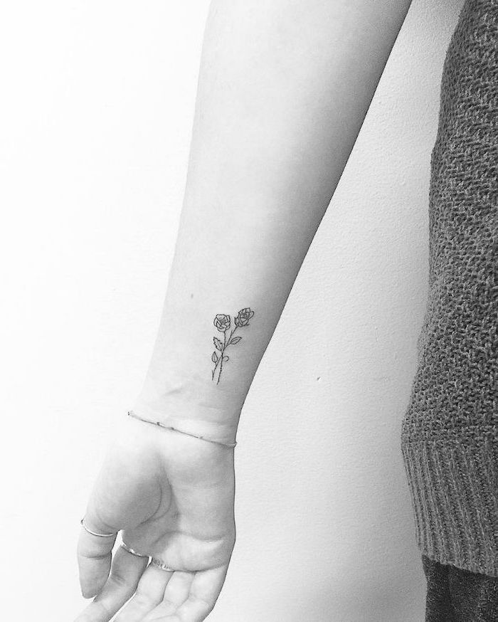 unique tattoos, flowers tattoo on the wrist, white background