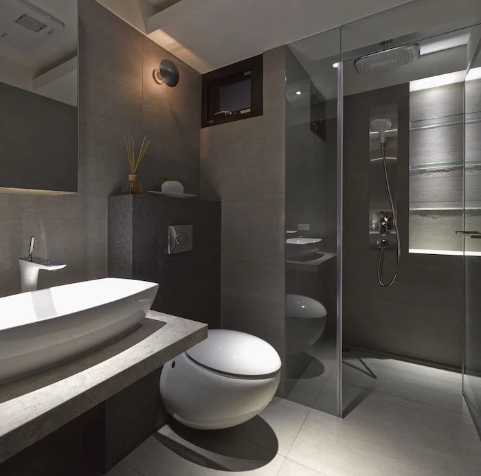 grey tiled walls and floor, glass shower door, bathroom remodel ideas, floating marble sink