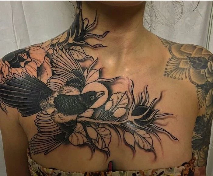 large hummingbird, flowers and leaves on the shoulders, small chest tattoos, floral top