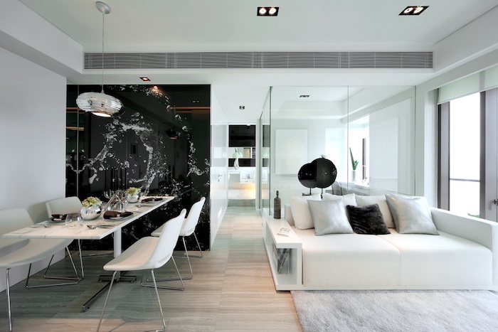 black and white glass wall, white sofa and rug, best colors for living room walls