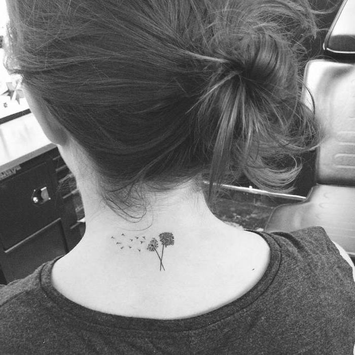 dandelion tattoo on the neck, brown hair in a bun, cute tattoos for girls