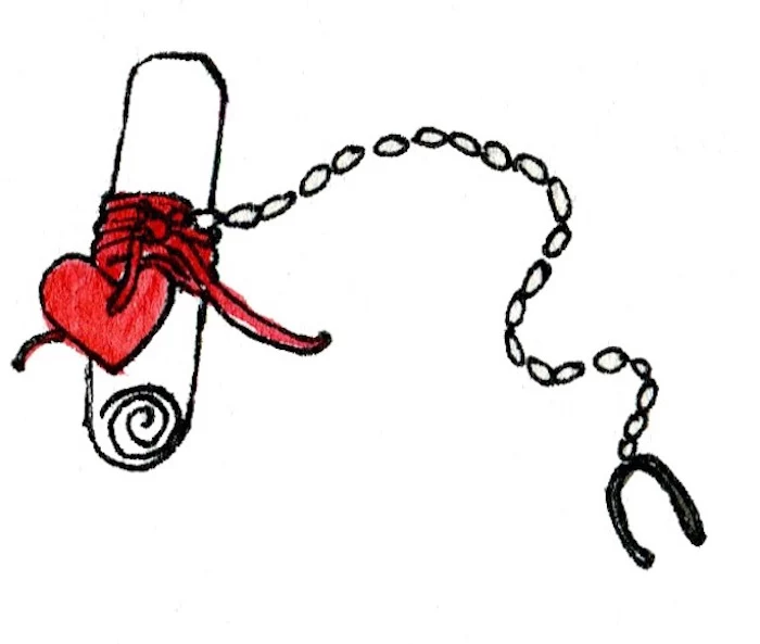 red heart attached with a chain, message written on a piece of paper, customised gifts for boyfriend