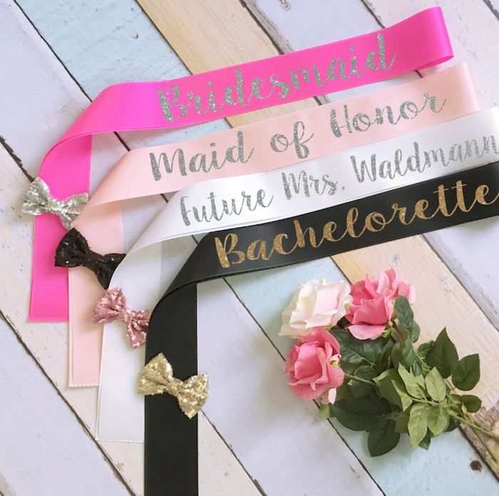 satin sashes, bows on the sashes, bouquet of roses, bachelorette ideas, wooden background