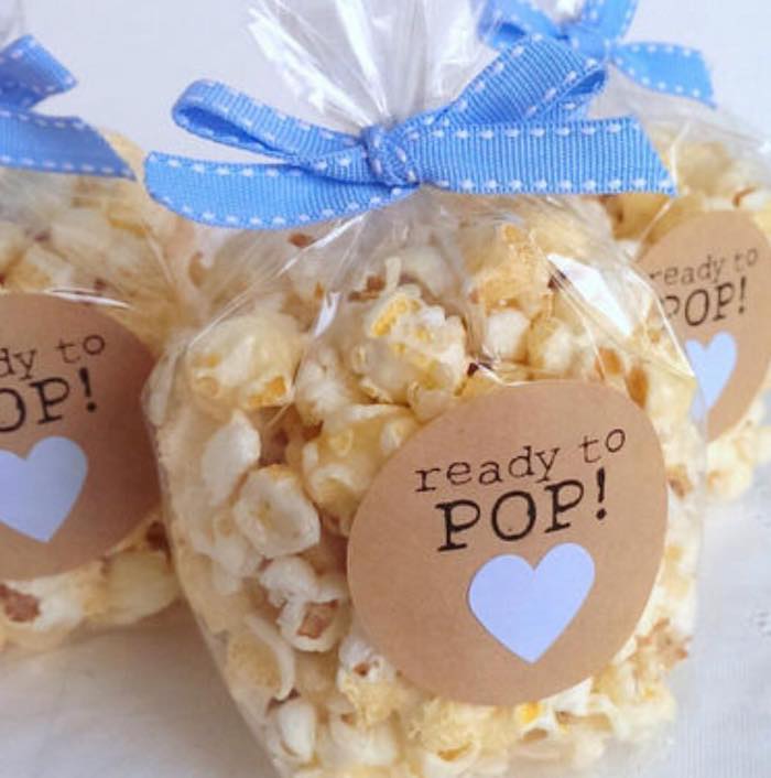ready to pop label, cute baby shower themes for a boy, popcorns in a bag, blue bow