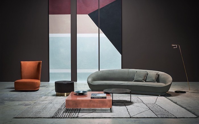 purple beige black and blue geometrical wall installation, grey sofa, wall designs, brown armchair