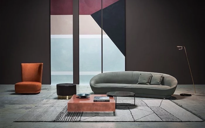 purple beige black and blue geometrical wall installation, grey sofa, wall designs, brown armchair
