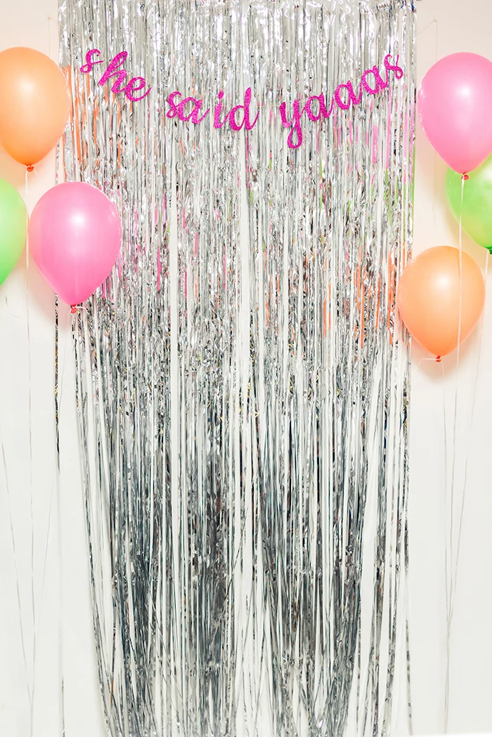 she said yaaas pink glitter sign, silver tassel, pink orange and green balloons, unique bachelorette party ideas
