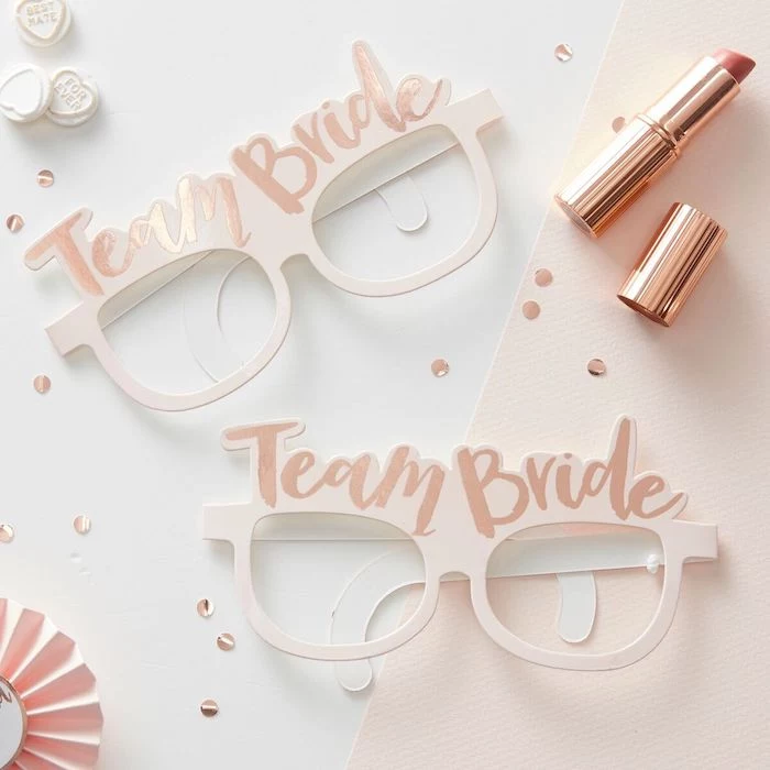 team bride blush glasses, golden lipstick, wild bachelorette party, white background