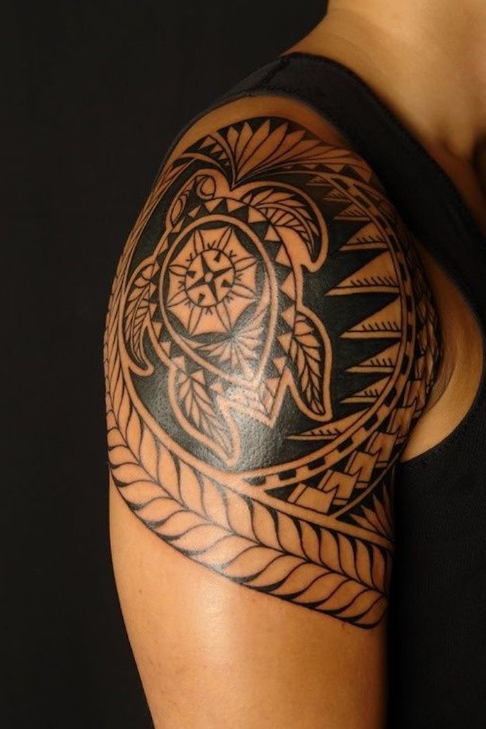 tribal turtle on the shoulder, meaningful tattoo ideas, black top and background