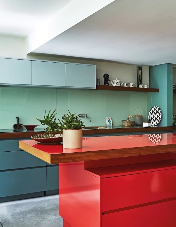 turquoise backsplash, blue cabinets, red kitchen island, kitchen cabinet design