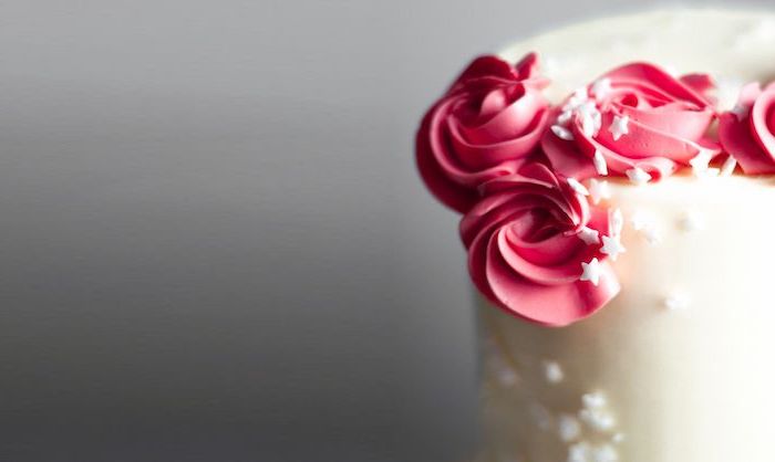 red roses, white star sprinkles, how to make a unicorn horn, white fondant, grey background