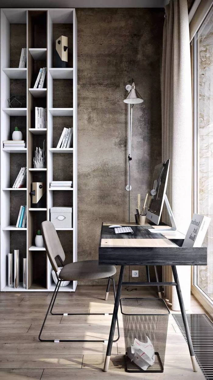 office design ideas, tall white bookcase, black wooden desk, small grey chair, lamp mounted on the wall