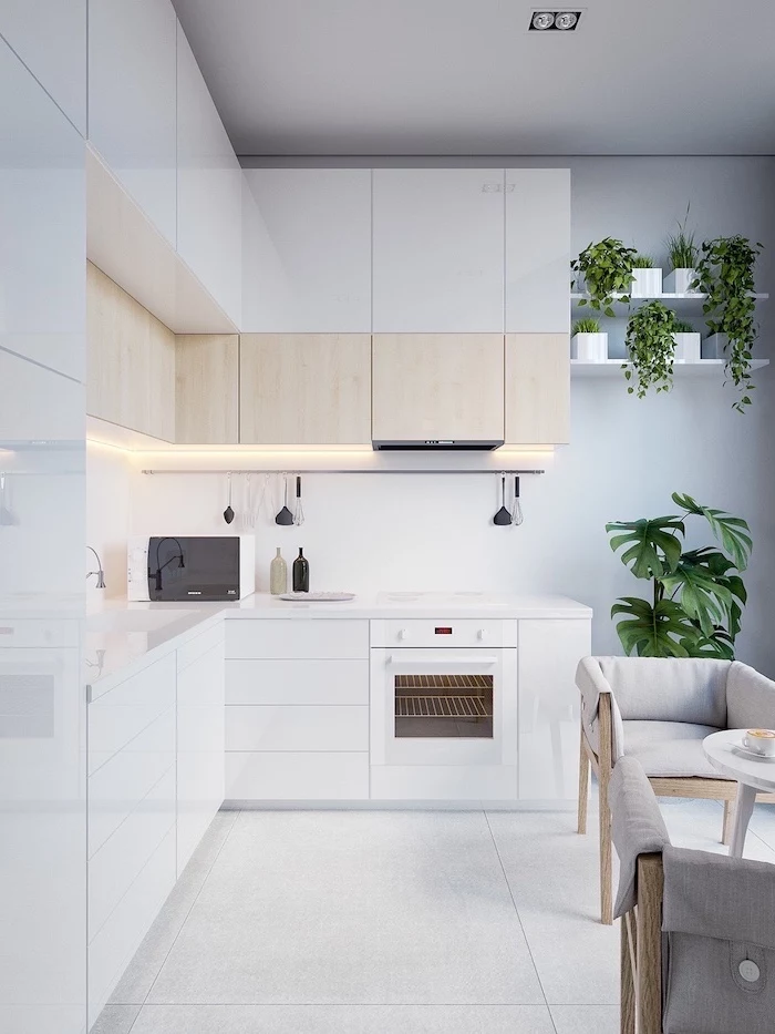 white and wooden cabinets, white tiled floor and counters, kitchen renovation, grey chairs