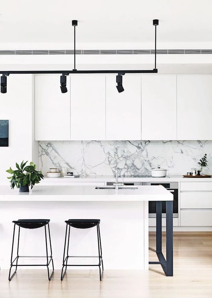 marble backsplash, kitchen ideas, white cabinets and kitchen island, black stools