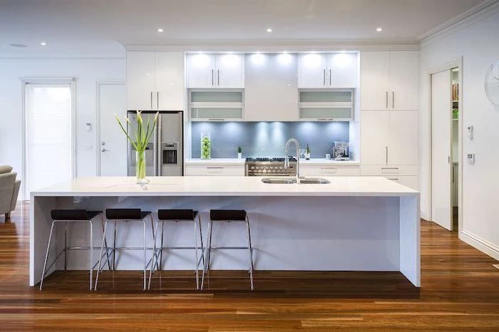 white kitchen island, kitchen designs photo gallery, white cabinets and drawers, black stools