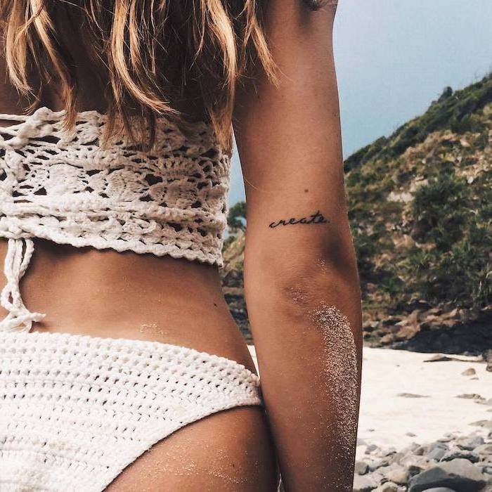 white knitted bathing suit, create inscription, female tattoos gallery, tattoo above the elbow