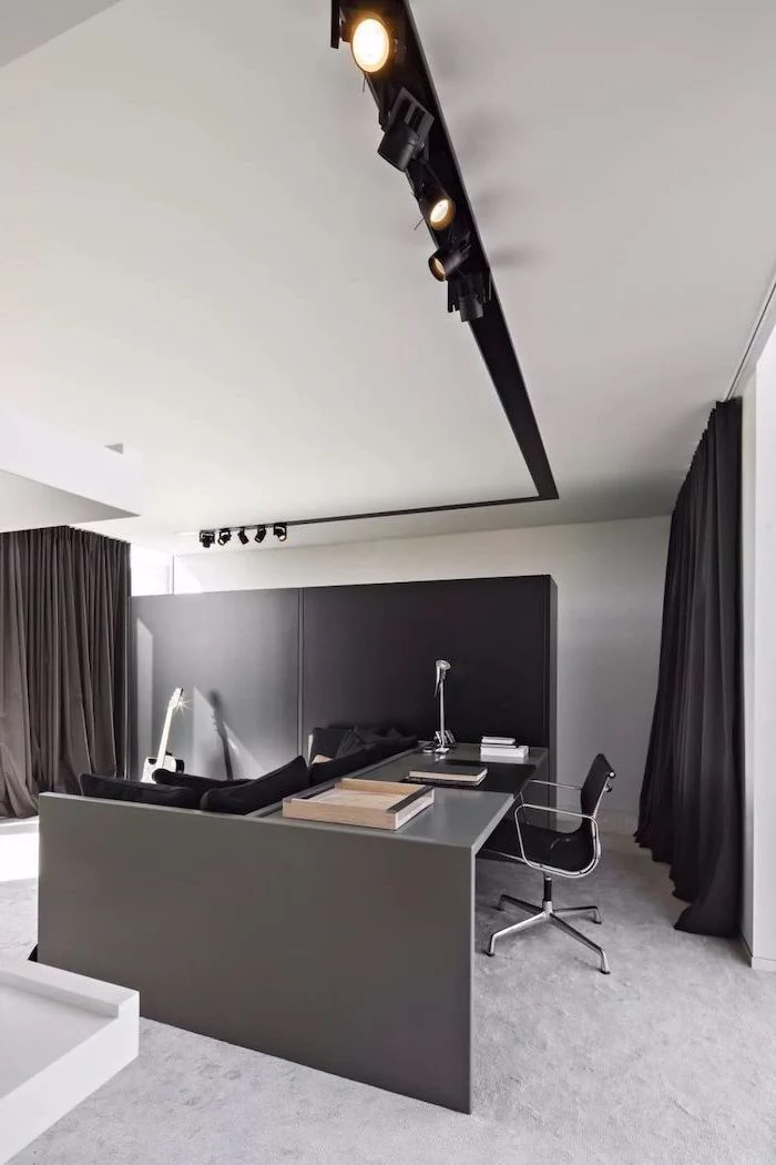 black curtains, black wooden desk and chair, white rug, home ideas, guitar on the floor